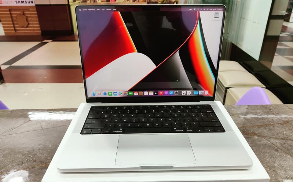 A close up photo of Apple MacBook Pro 14 on desk during our testing for best laptops for day traders.